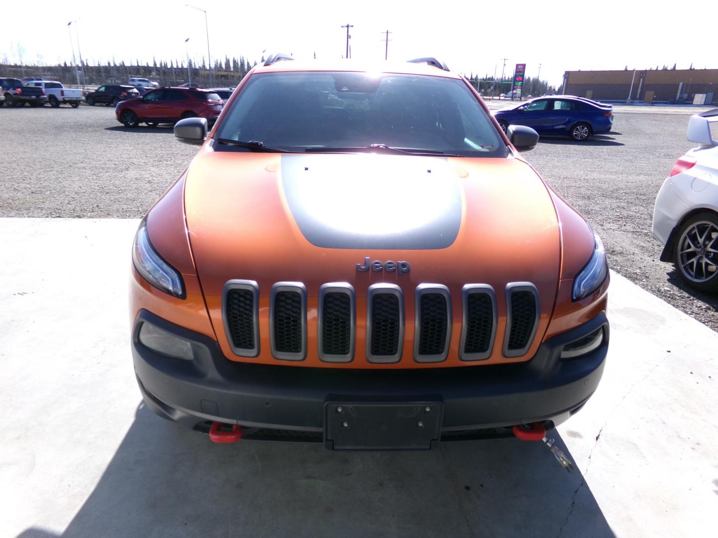 2015 orange Jeep Cherokee Trailhawk (1C4PJMBS1FW) with an 3.2L V6 DOHC 24V engine, 9-Speed Automatic transmission, located at 2630 Philips Field Rd., Fairbanks, AK, 99709, (907) 458-0593, 64.848068, -147.780609 - Photo#1